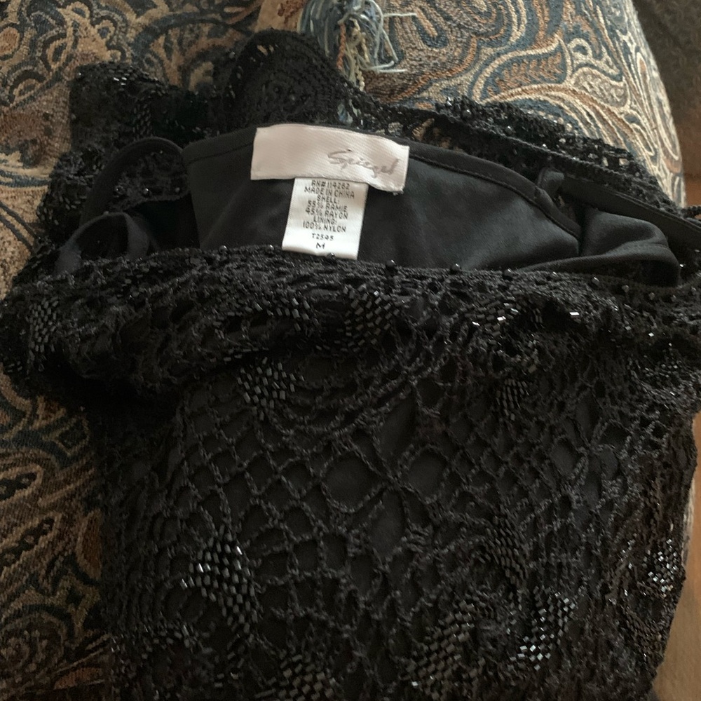 crocheted & beaded black evenings dress withh black bodce underneath.